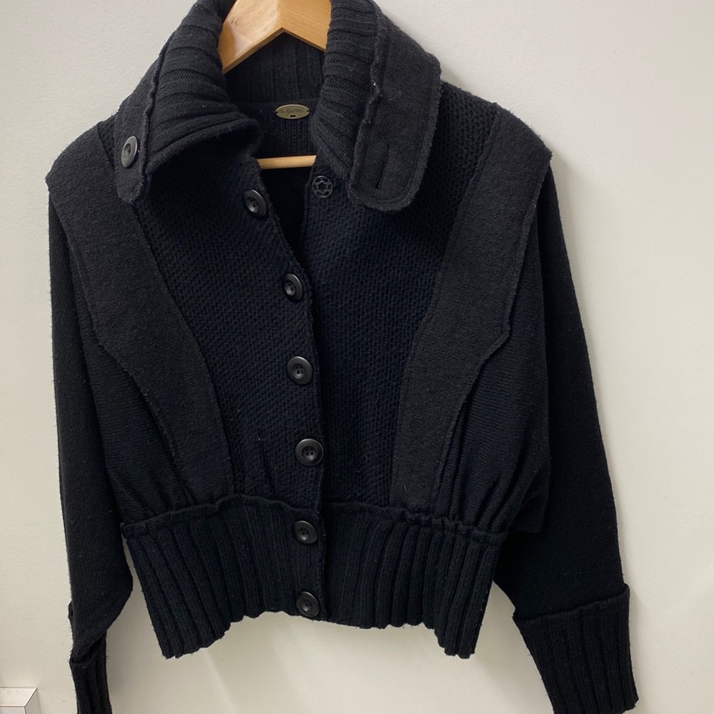 One girl who wool black sweater